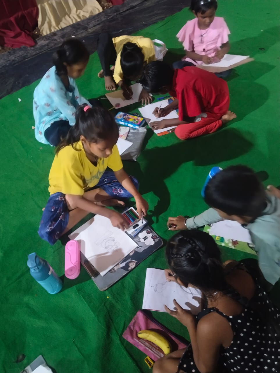 Children's are busy to draw the drawing of Ganesha