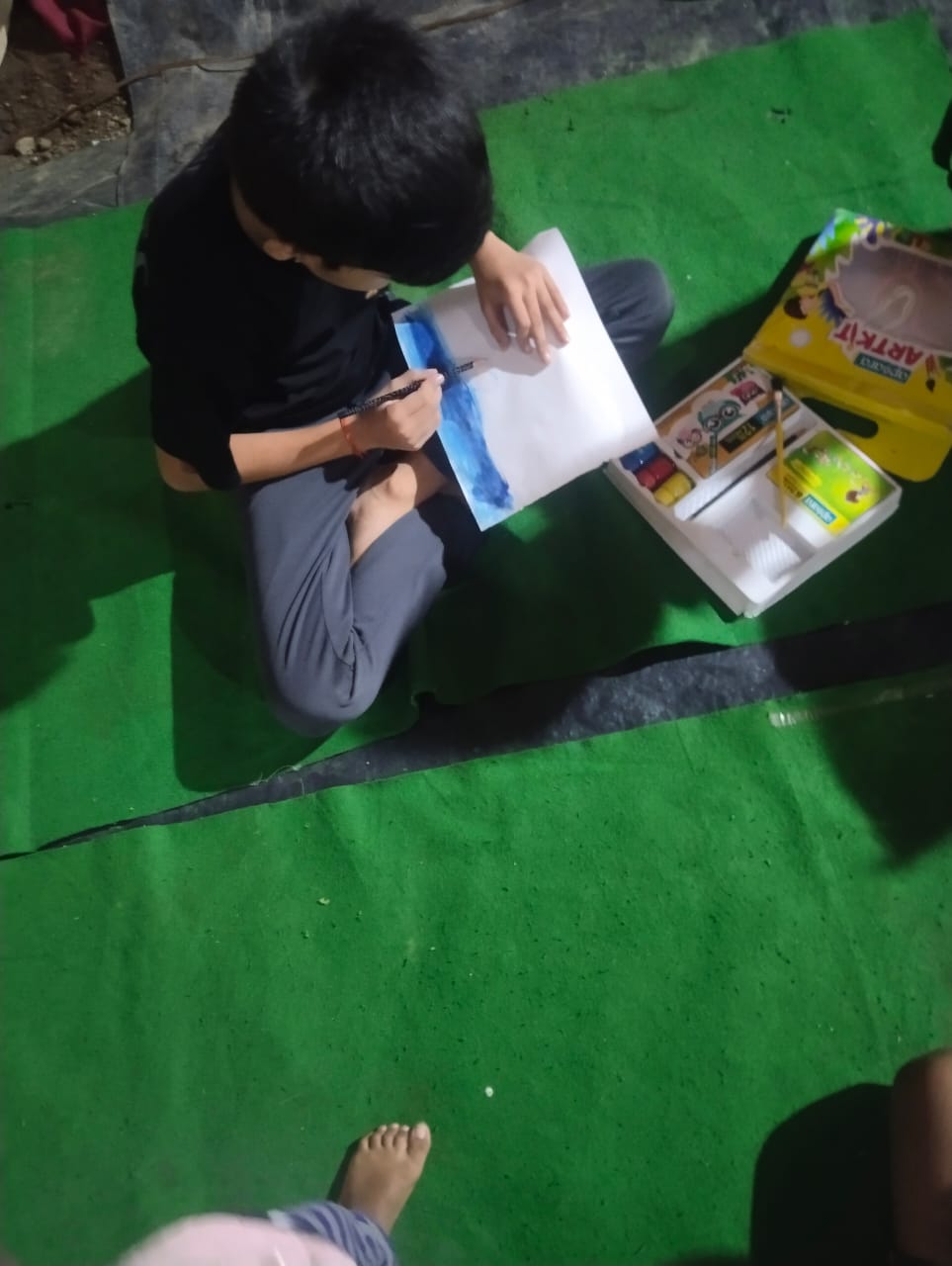 He is repairing Ganesh visarjan scenery