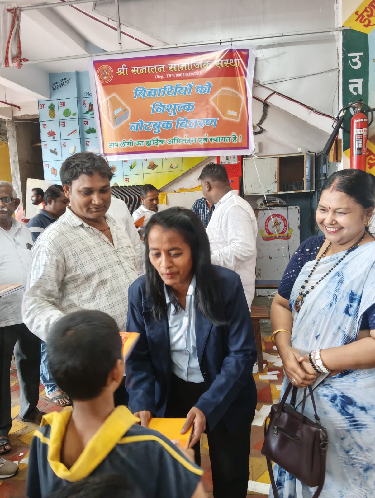 Notebook Distribution to Children by Shri Sanatan Seva Sanstha